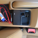 Under the armrest: Pro tip, use a 90 degree stereo adapter to get more useable space.